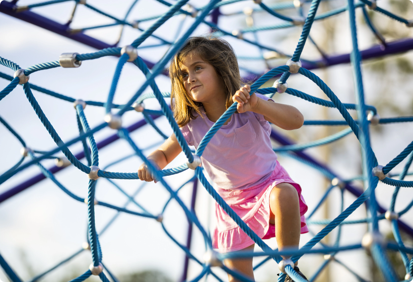 Child climbing on the Ascend Rope Climber